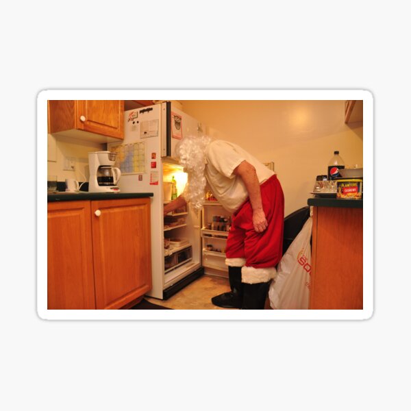 Santa is snacking Sticker