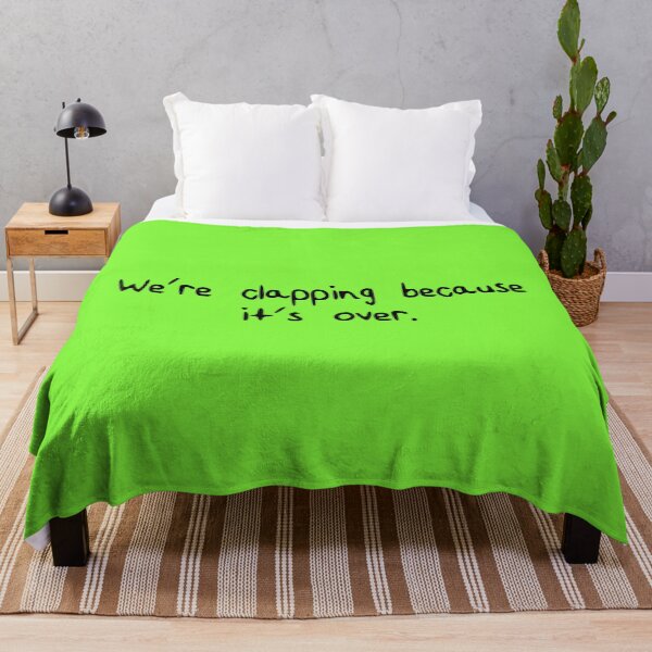 Item preview, we're clapping because it's over. [black writing/green background] designed and sold by LadyKaramazov.