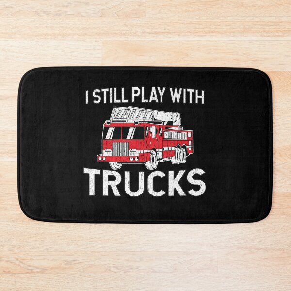 Item preview, I Still Play With Trucks designed and sold by teesaurus.