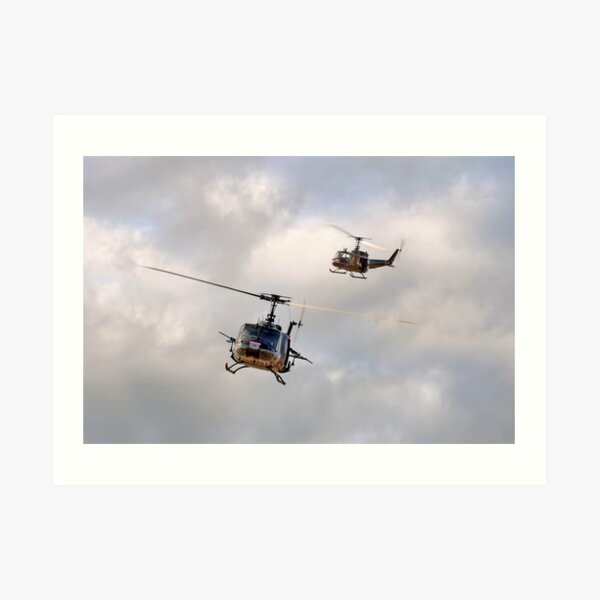 Canvas UH-1 Huey Helicopter Against Pink Sky Art print POSTER