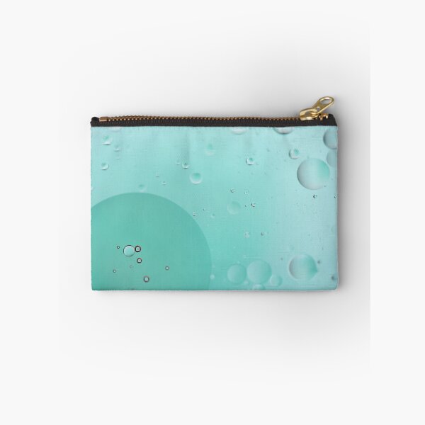 Item preview, Oil drops in water. Defocused abstract psychedelic pattern image light blue colored. DOF. designed and sold by anytka.