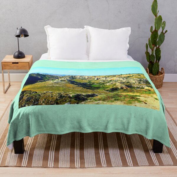 Item preview, Rocky canyon partly covered with green grass and randomly placed shrubs near Matera designed and sold by Kristina Drozd.