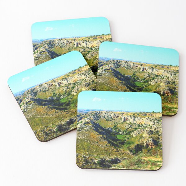Item preview, Rocky canyon partly covered with green grass and randomly placed shrubs near Matera designed and sold by Kristina Drozd.