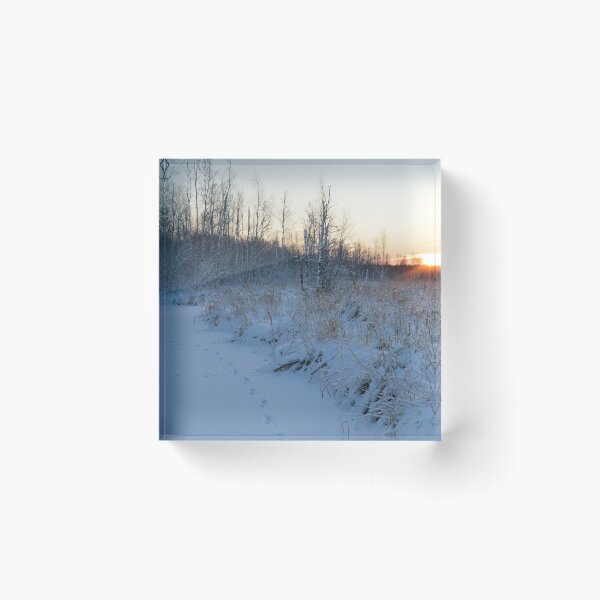 Item preview, Sunrise on a frozen snowy river forest river in the tracks of wild animals designed and sold by yarvin13.