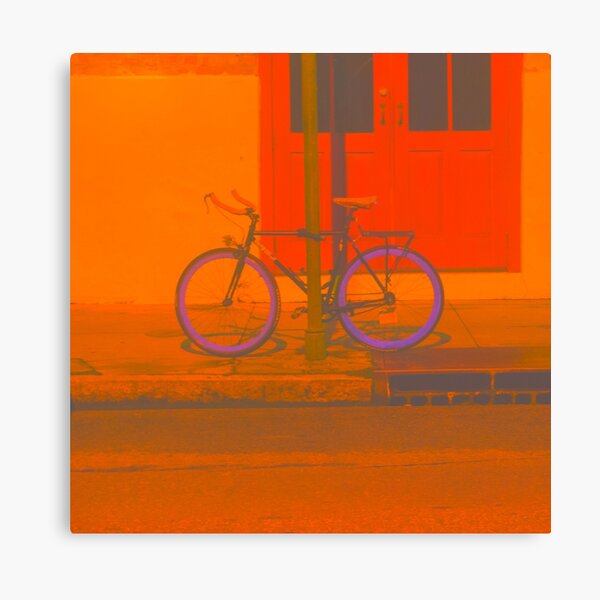Biking Along Canvas Print