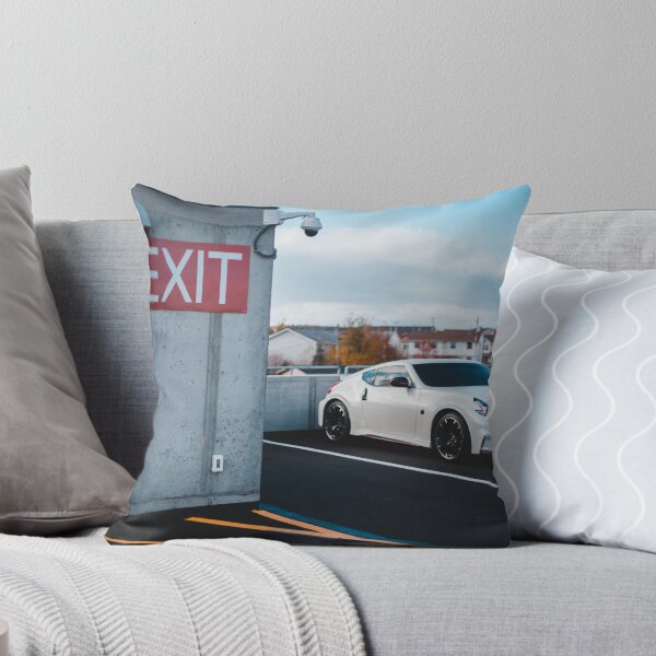 Item preview, white Nissan Nismo 370z parked on roof designed and sold by erikallen920.