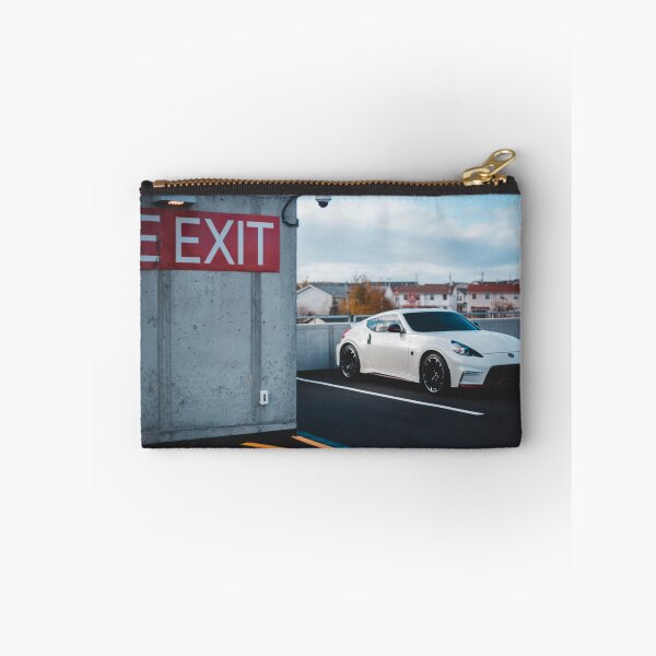 Item preview, white Nissan Nismo 370z parked on roof designed and sold by erikallen920.