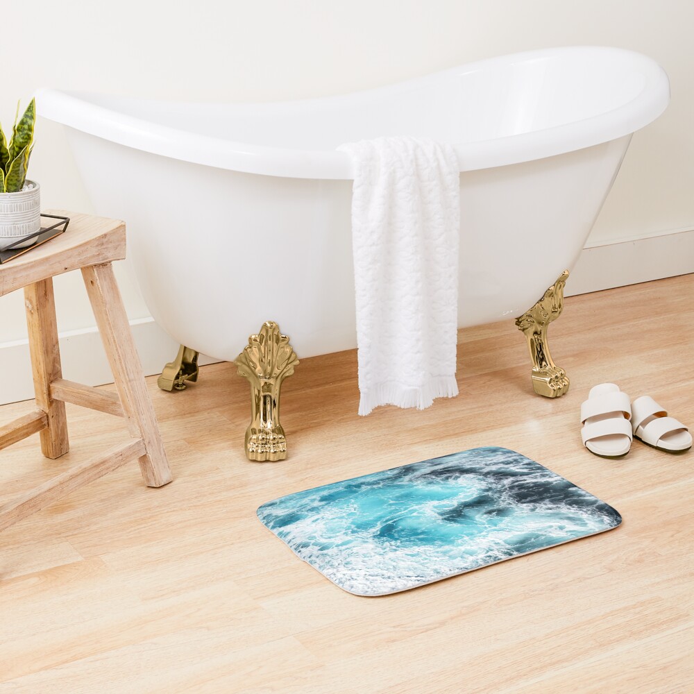 mesmerizing blue ocean waves Bath Mat