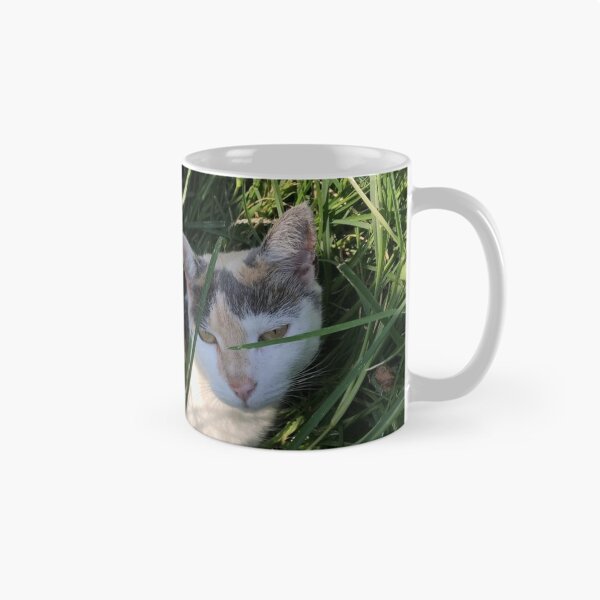 Item preview, farm cat resting in the grass designed and sold by Eliza Hartman.