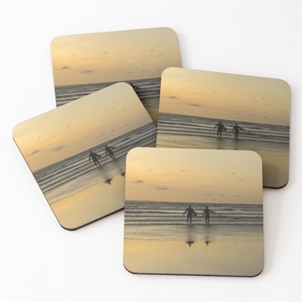 Item preview, sunset surfers heading out to the waves designed and sold by twymanphoto.