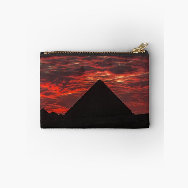 Item preview, Dramatic sunset behind one of the 3 great Pyramids in Cairo - Egypt designed and sold by MichielTon.