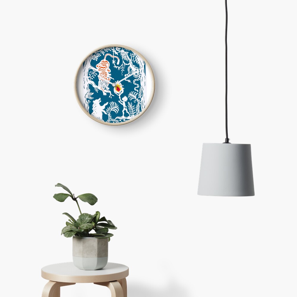 Mogli faces the Tiger ( Blue backdrop) Clock