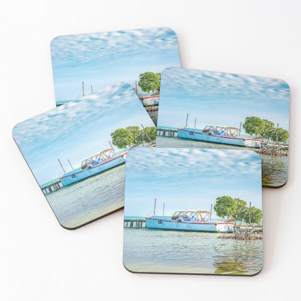 Item preview, A boat at a pier on Caye Caulker in Belize designed and sold by MichielTon.