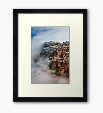 Clouds surrounding the "Towers" of Astraka Framed Print